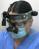 Front of SV Face Shield Loupe-Friendly System being used with flip-up loupes and ultra-mini LED headlight with Multi-Mini mounting clip
